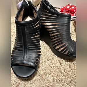 Black wedges from Torrid, size 7W. Worn a handful of times, perfect for GNO!